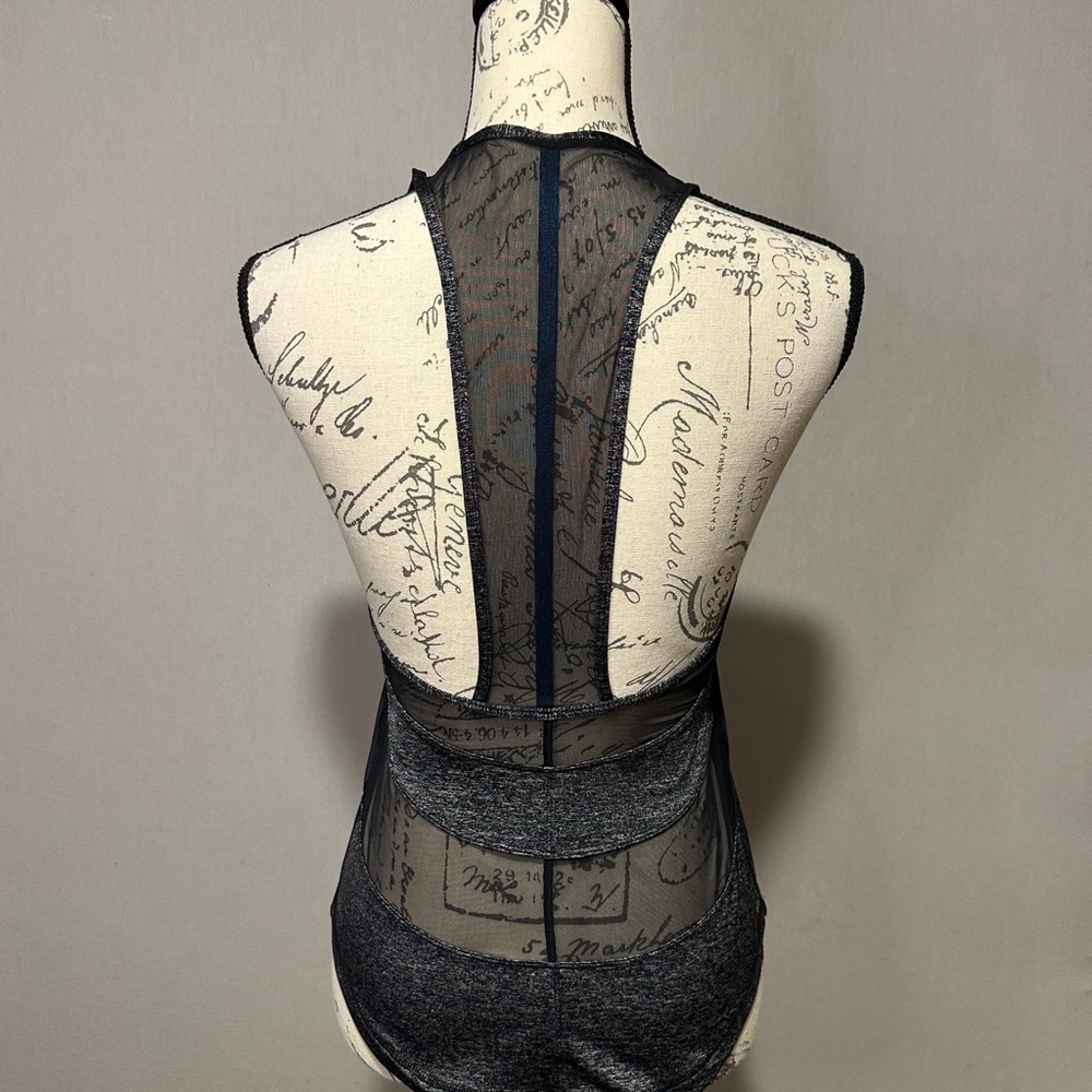Lululemon Athletica Gray and Black Asymmetrical Cut Out Tank Top. Good cond. - Picture 4 of 8